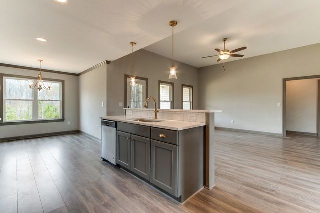 Kitchen With Gray Counter — Greensboro, NC — Sparks Homes & Home Renovations Inc