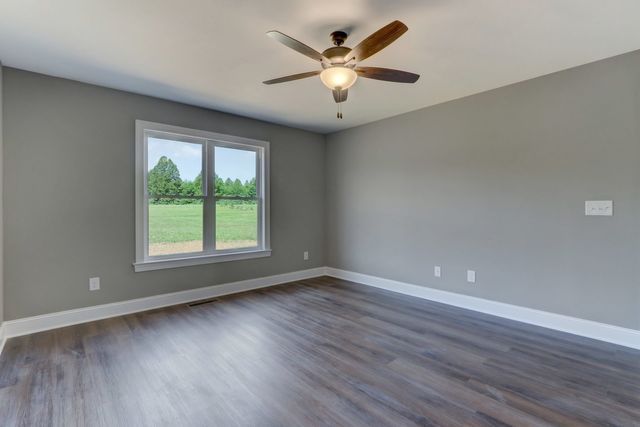 Room With Windows And Ceiling Fan — Greensboro, NC — Sparks Homes & Home Renovations Inc
