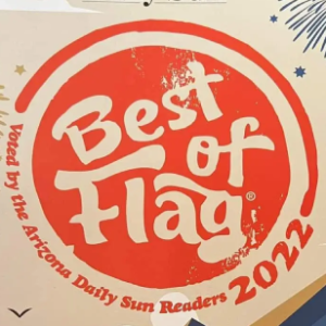 Red circular “Best of the Valley” 2022 badge with Arizona Daily Sun Readers text on a white background