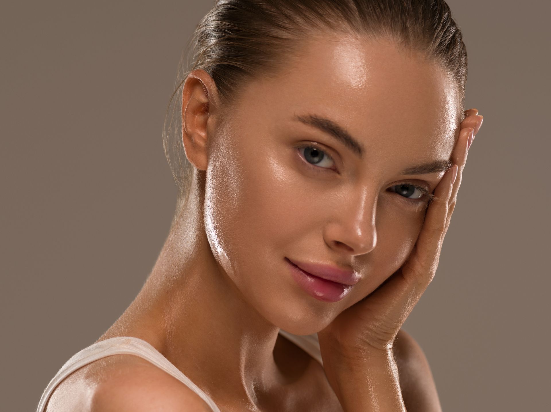 A woman with a glowing face. 