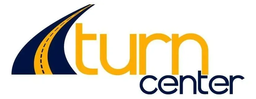 Logo for Turn Center featuring a curved road in yellow and blue, with the word