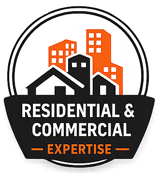 Residential and commercial real estate logo with black and orange buildings and house silhouettes