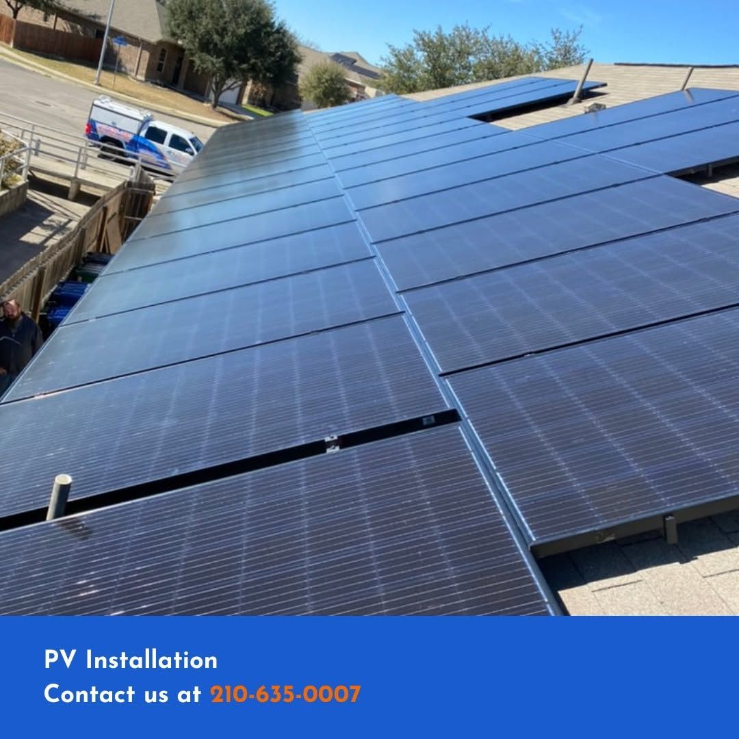 Solar panels installed on a roof under a clear sky, with PV installation contact text at the bottom.