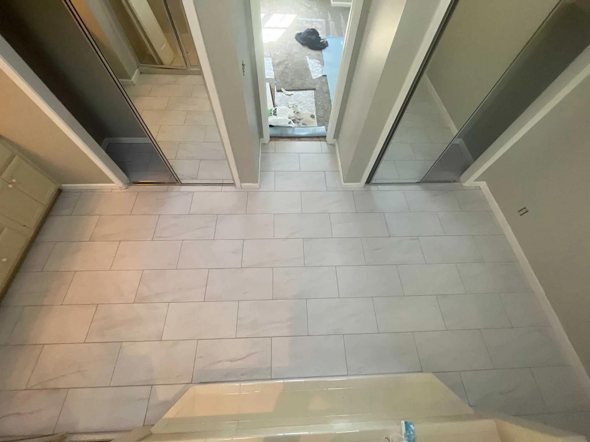 An aerial view of a bathroom with tile floors