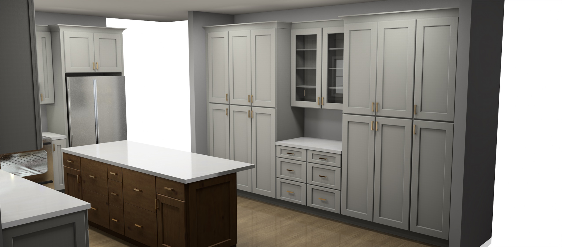 A kitchen with white cabinets and drawers is being built in a warehouse.