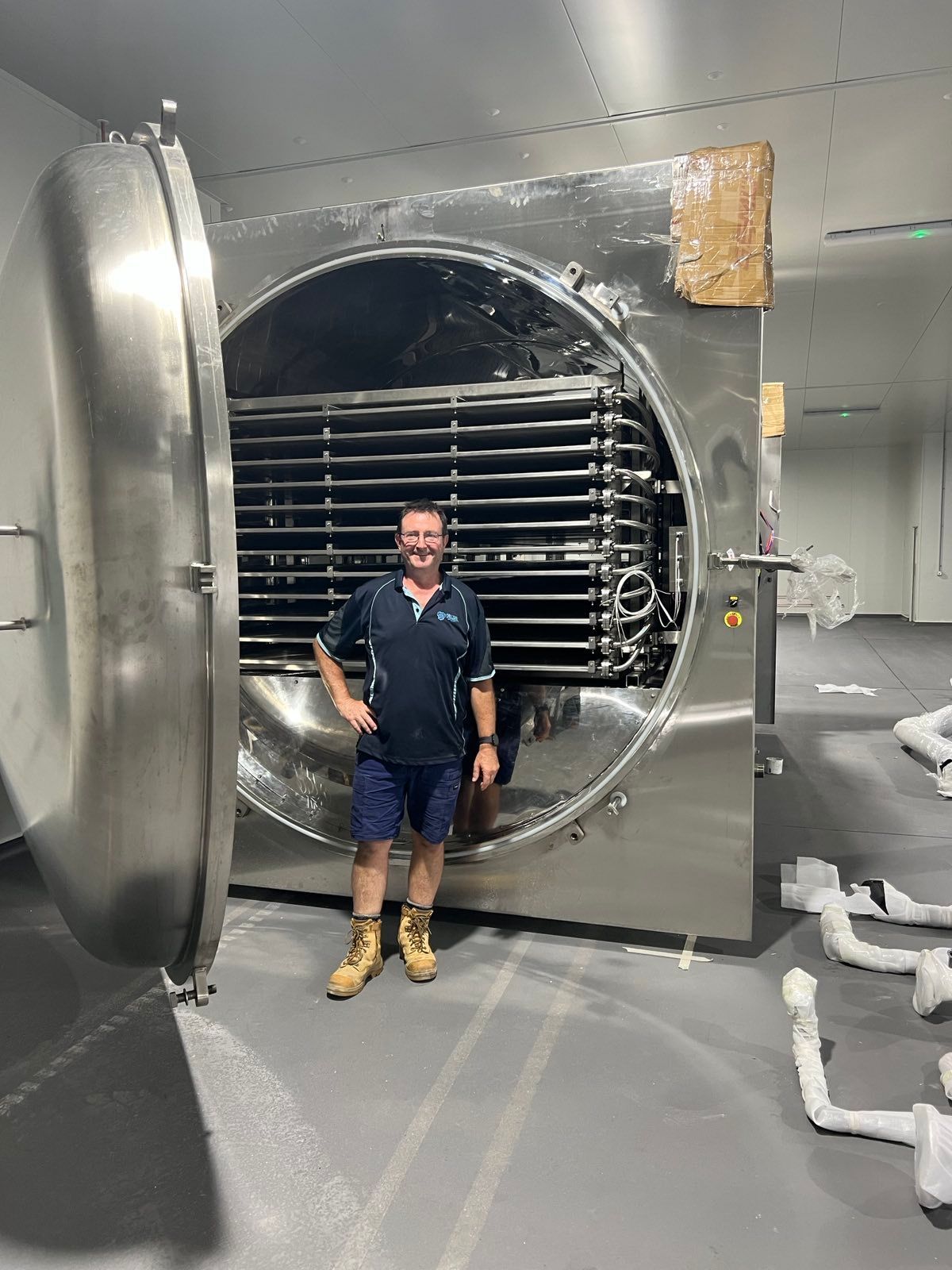 An Empty Room With a Lot of Hooks on the Wall — Chillzone Refrigeration and Air Conditioning in Montville, QLD
