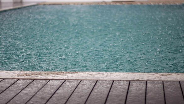 HOW RAIN CAN AFFECT YOUR SWIMMING POOL