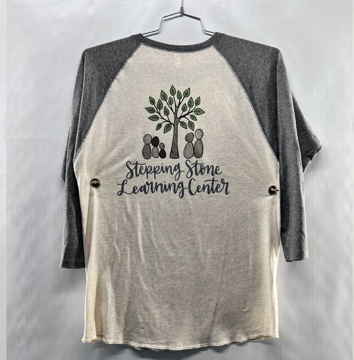 Raglan style shirt with gray sleeves and tan body, custom silk screened 
