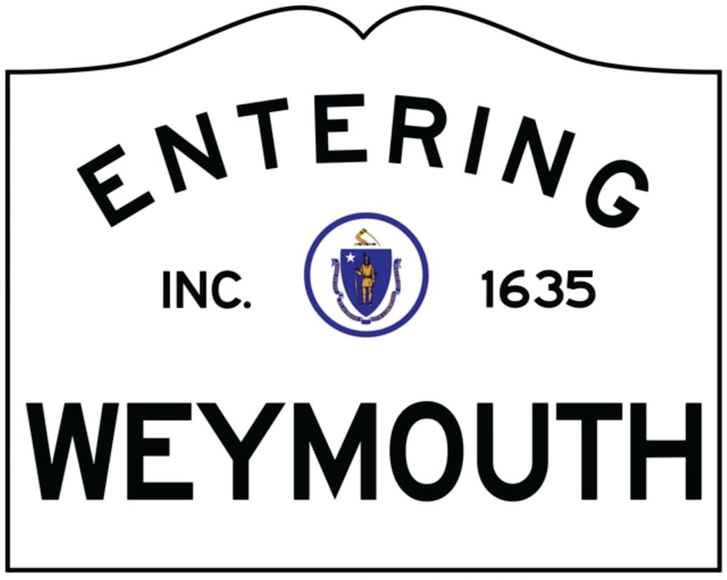 A town entry sign for Weymouth, Massachusetts, featuring the state seal, centered, with the text