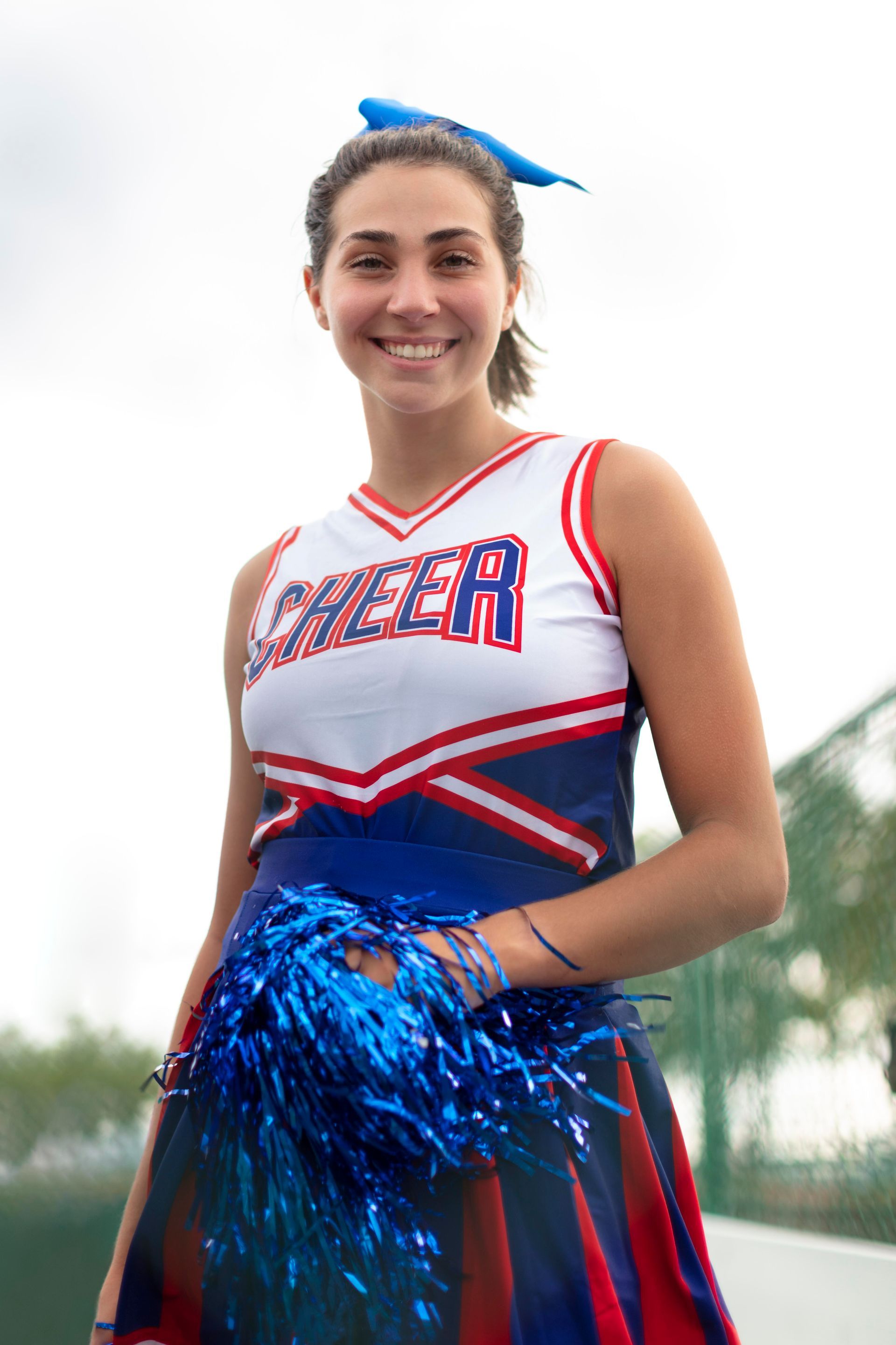 Custom blue and white cheerleading team uniform with
