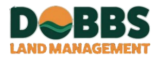 Logo for Dobbs Land Management featuring dark green text with an orange sun and green hills in the letter O.