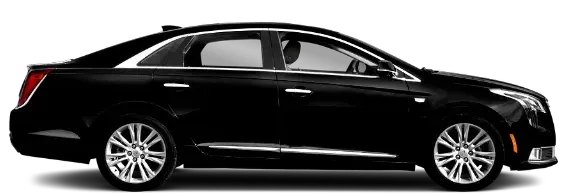 A black car is sitting on a white surface.