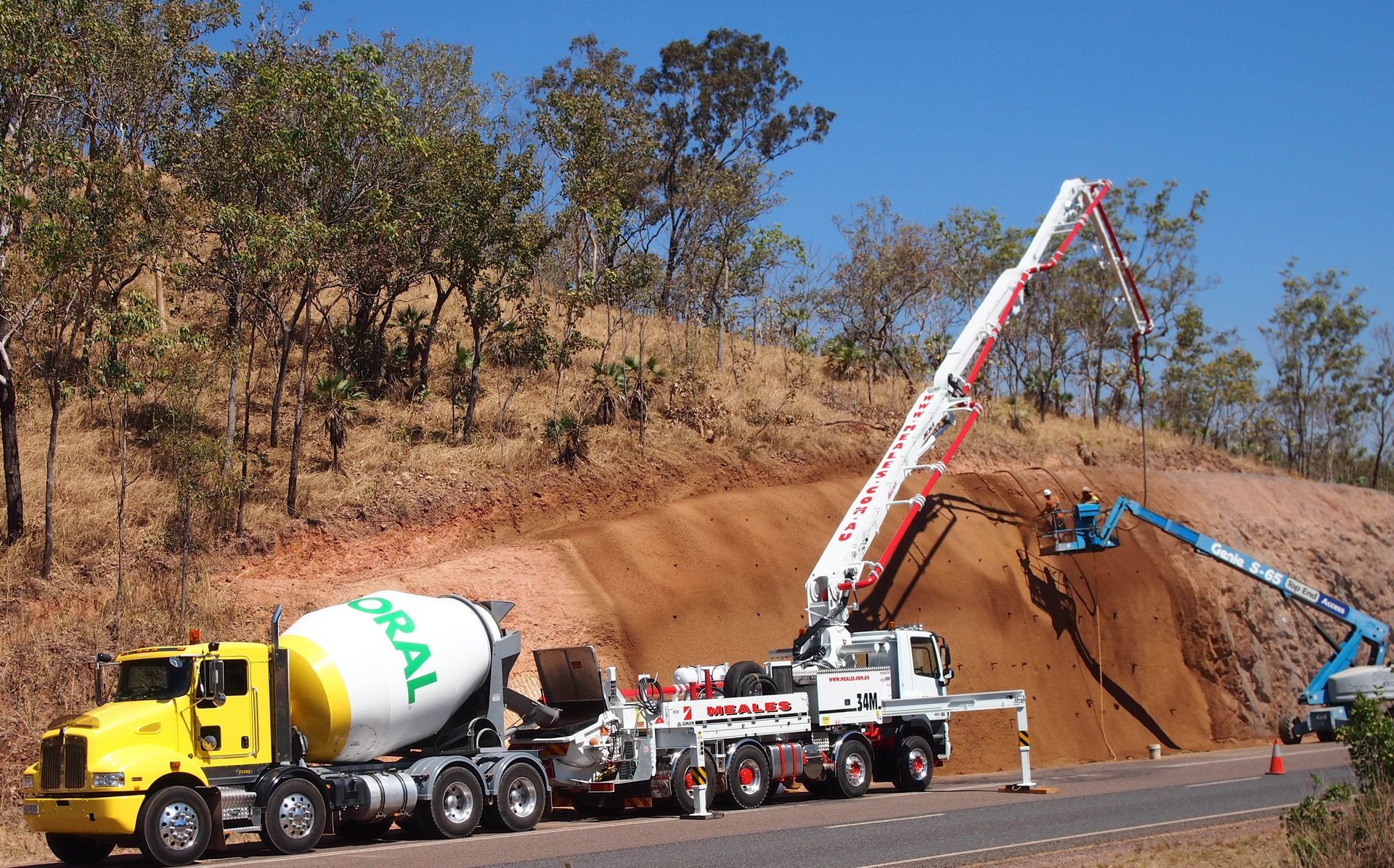 A concrete mixer truck with the word coral on it