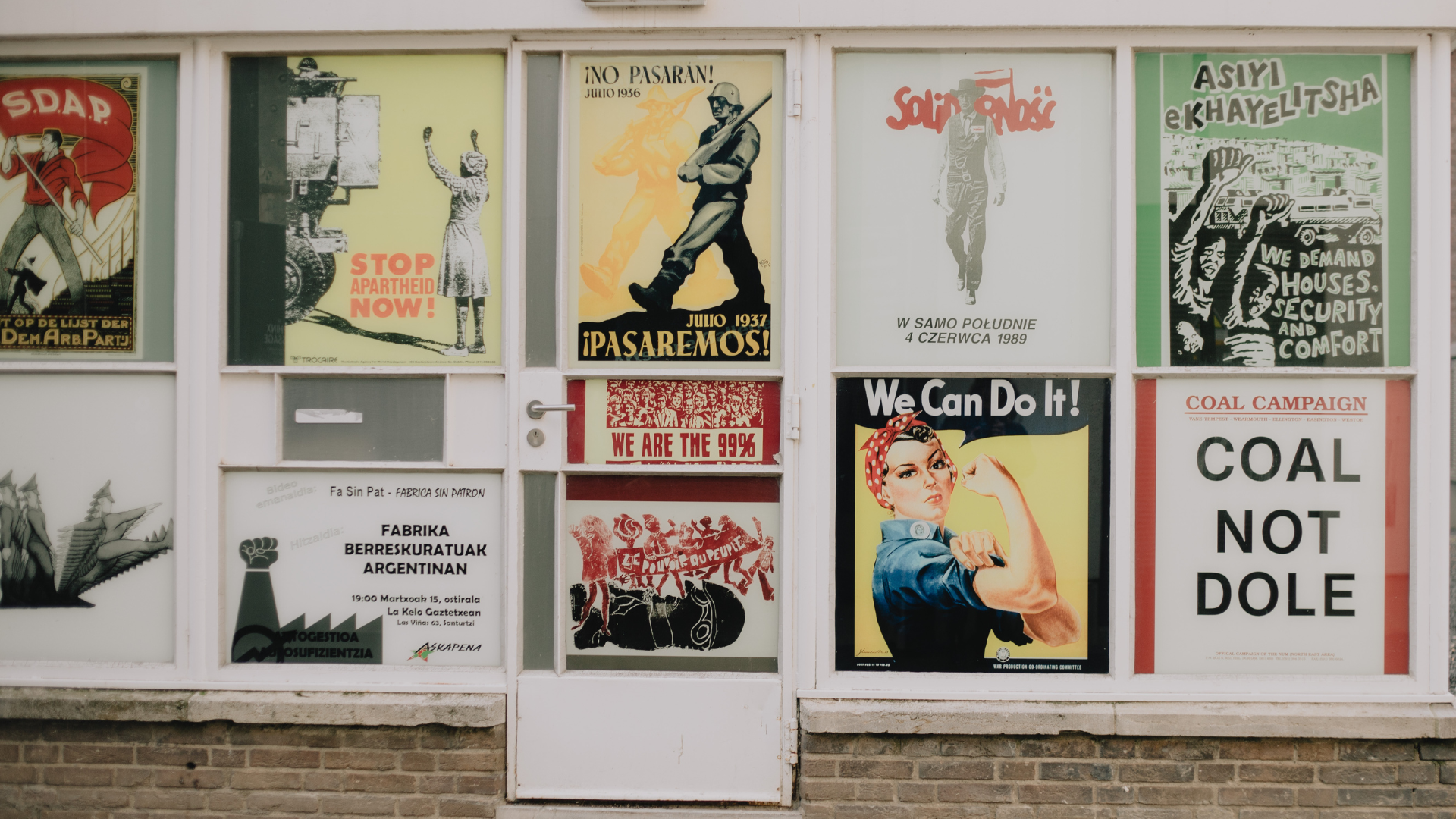 Wall display of vintage propaganda posters.
