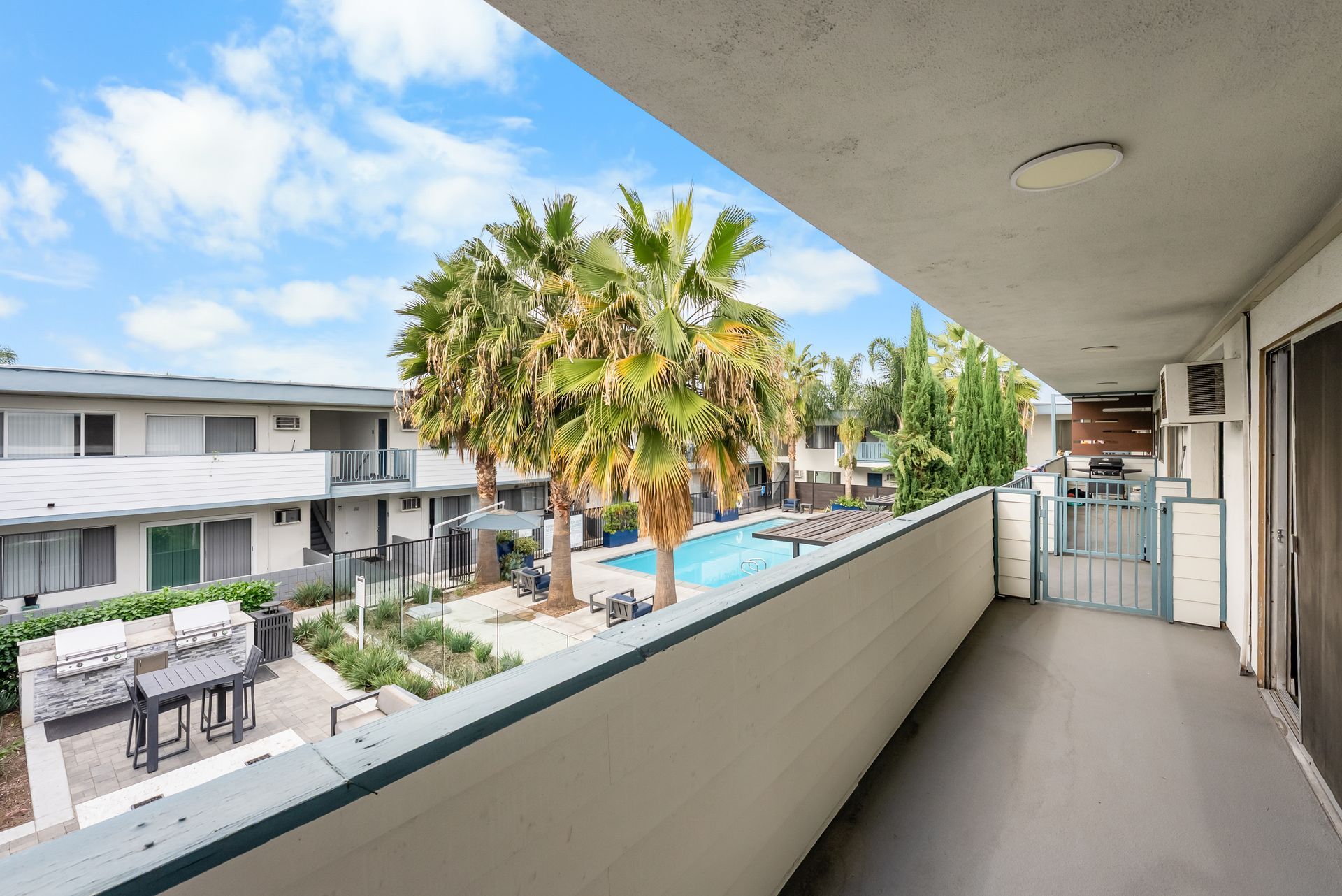 balcony with view of swimming pool