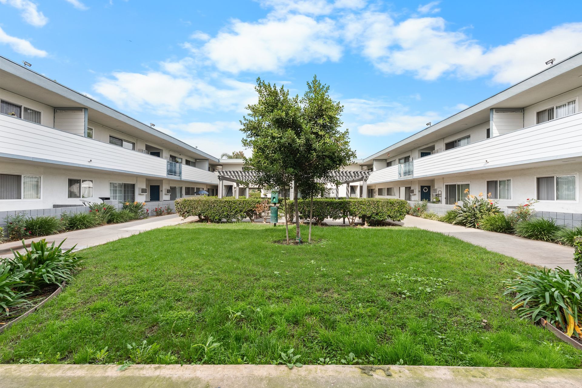 open field inbetween apartment buildings
