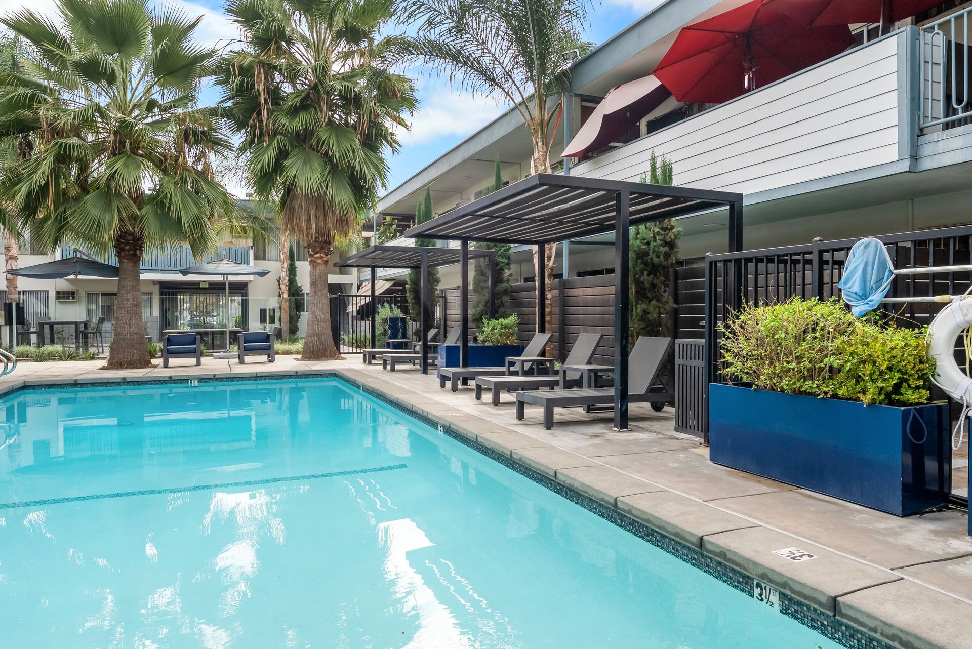 swimming pool and lounge chairs