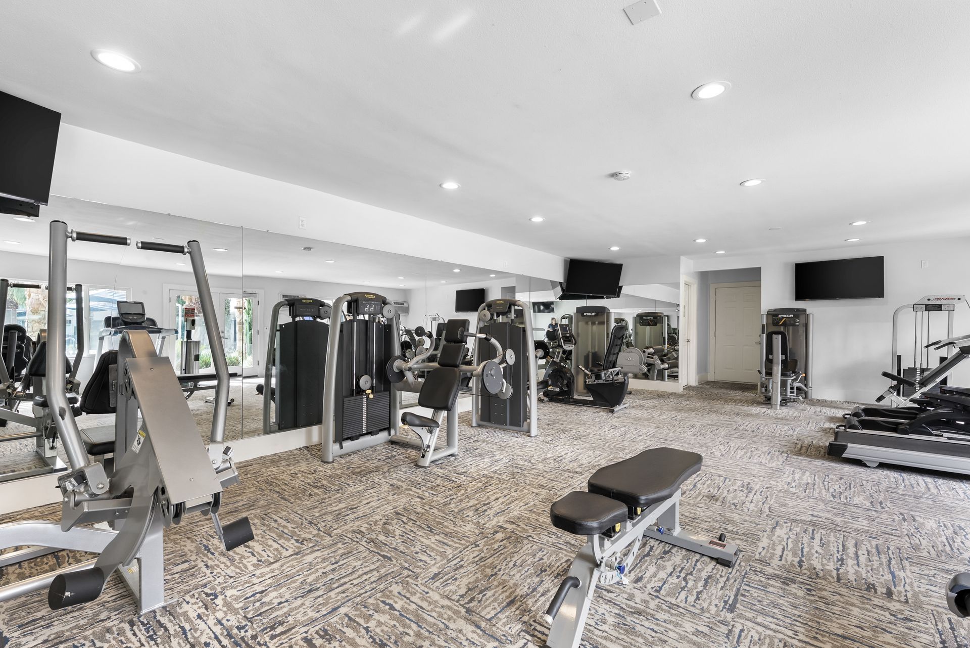 fitness studio with work out equipment