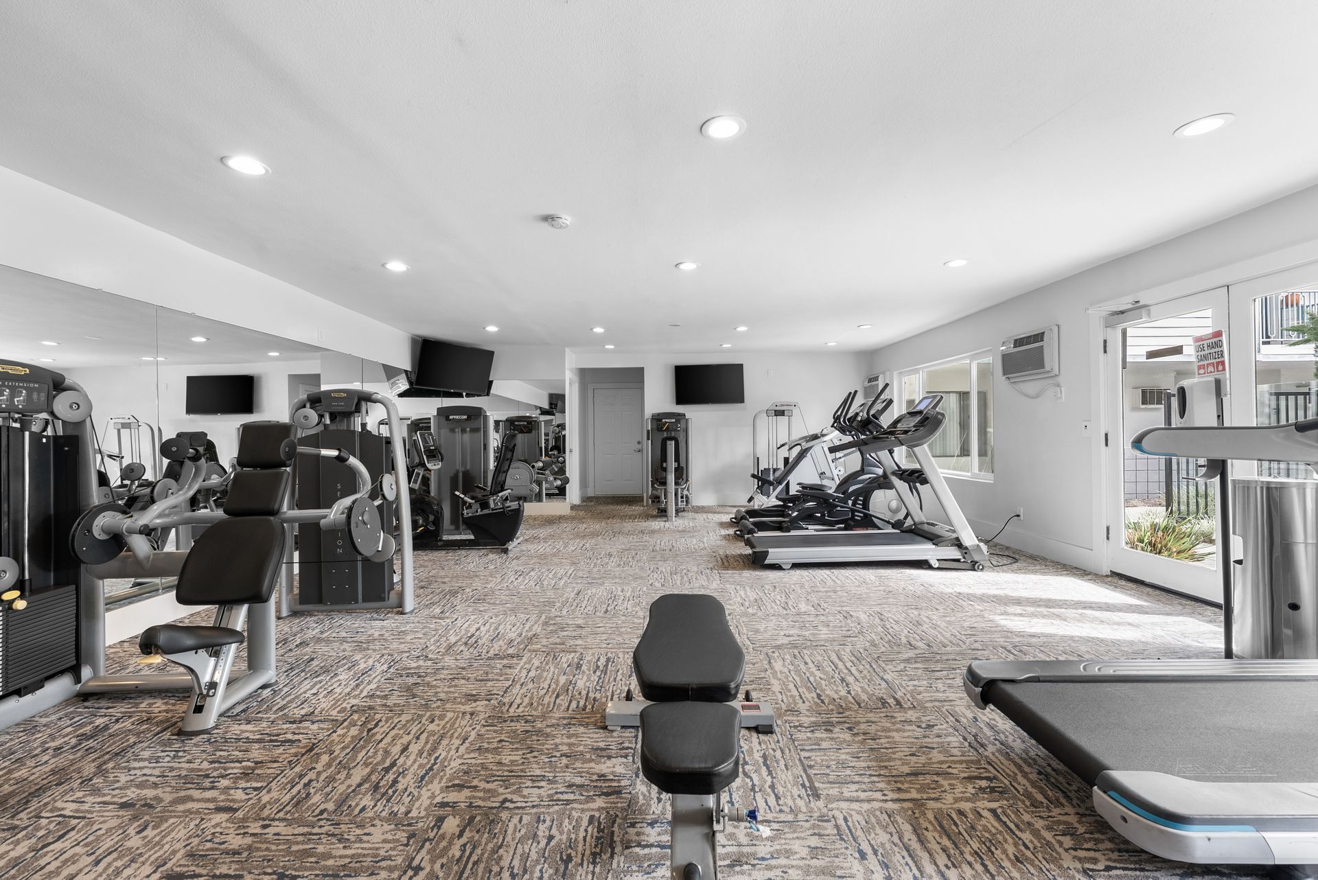 fitness studio with work out equipment