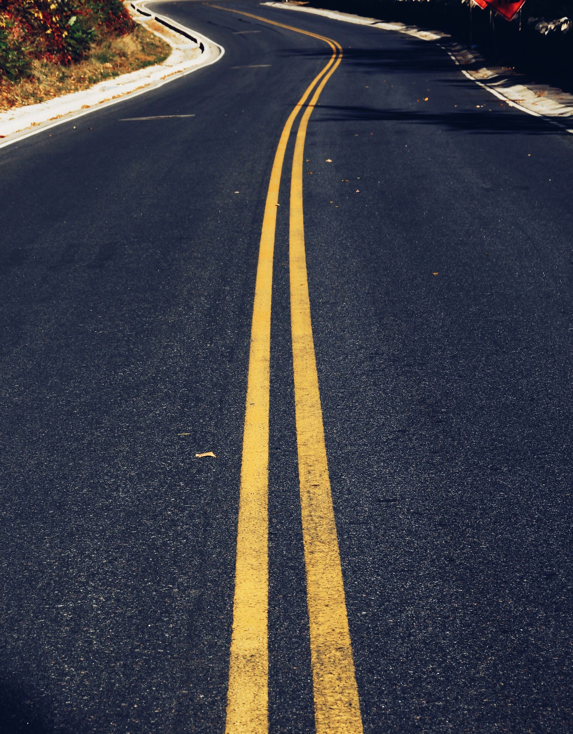 A well-traveled asphalt highway