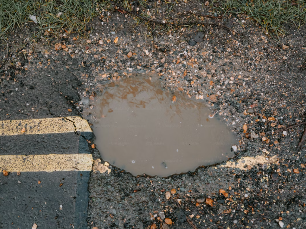 Pothole on asphalt road