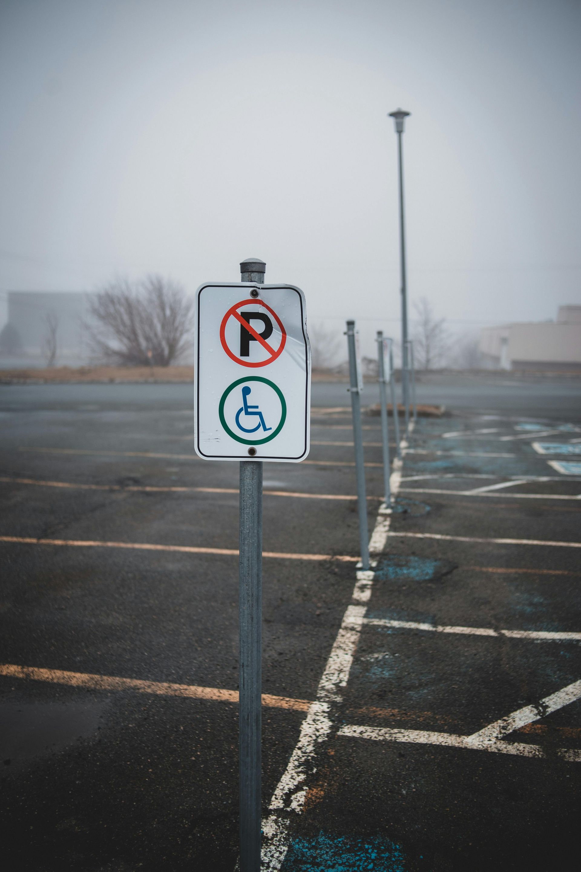 Old, worn asphalt parking lot