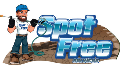 A mascot holding a pressure washer stands next to the 