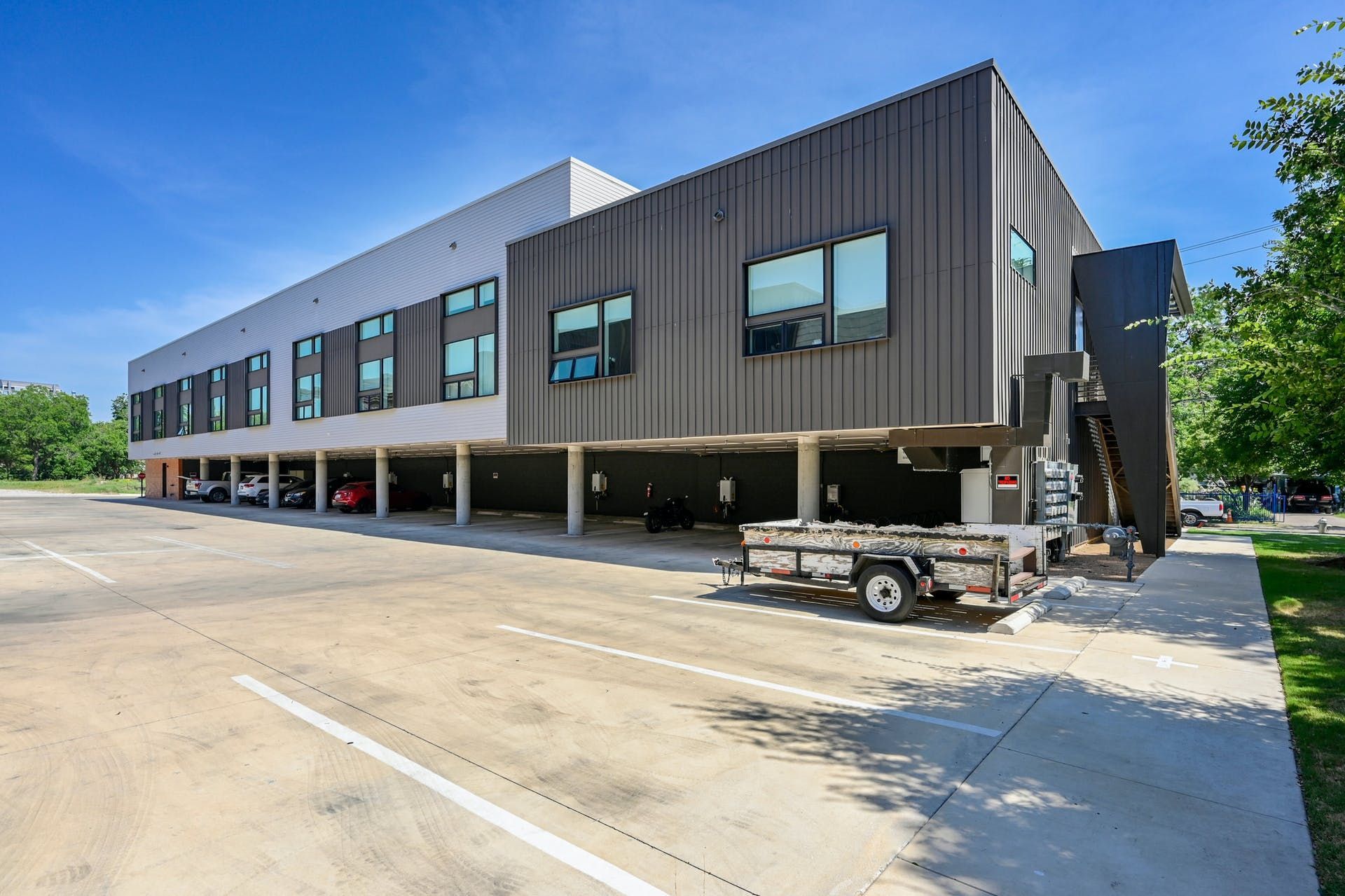 A large building with a truck parked in front of it.