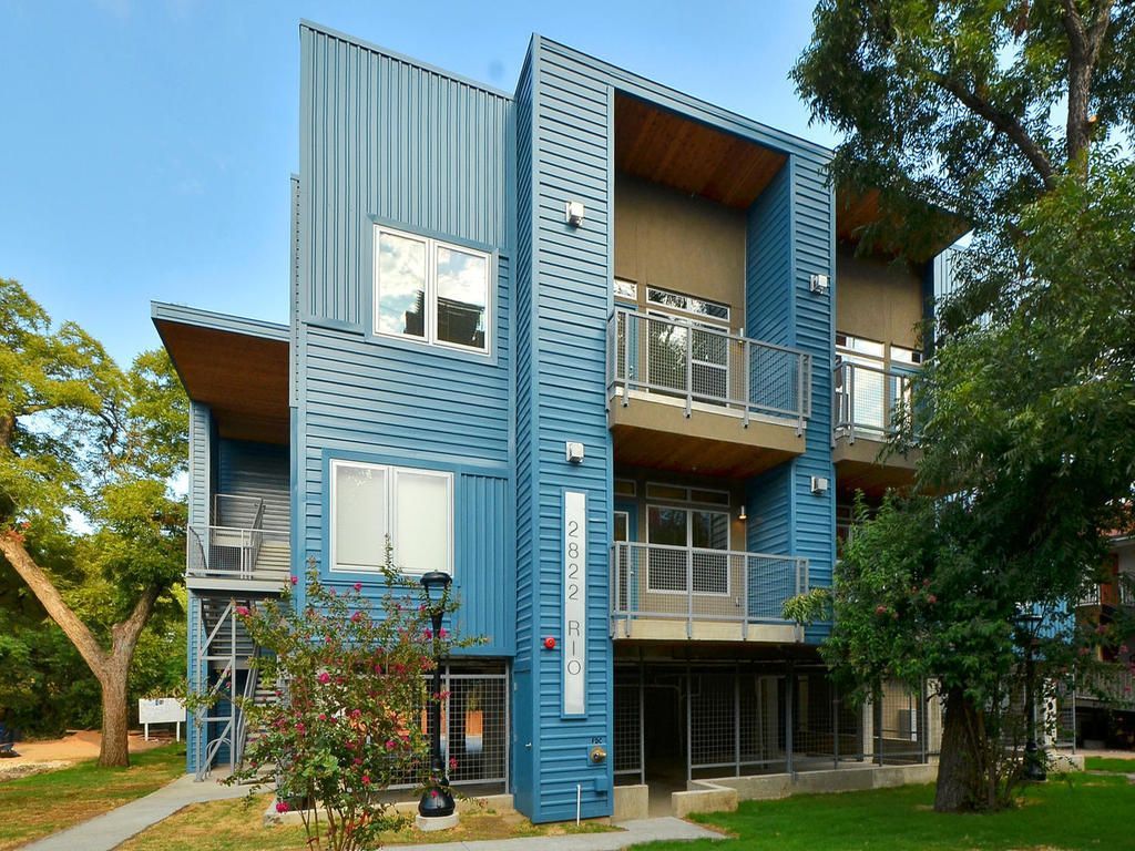 A blue building with a sign that says ' a ' on it