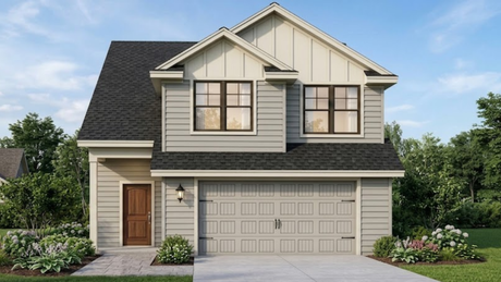 Two-story beige suburban house with a dark roof, front garage, and small landscaped yard