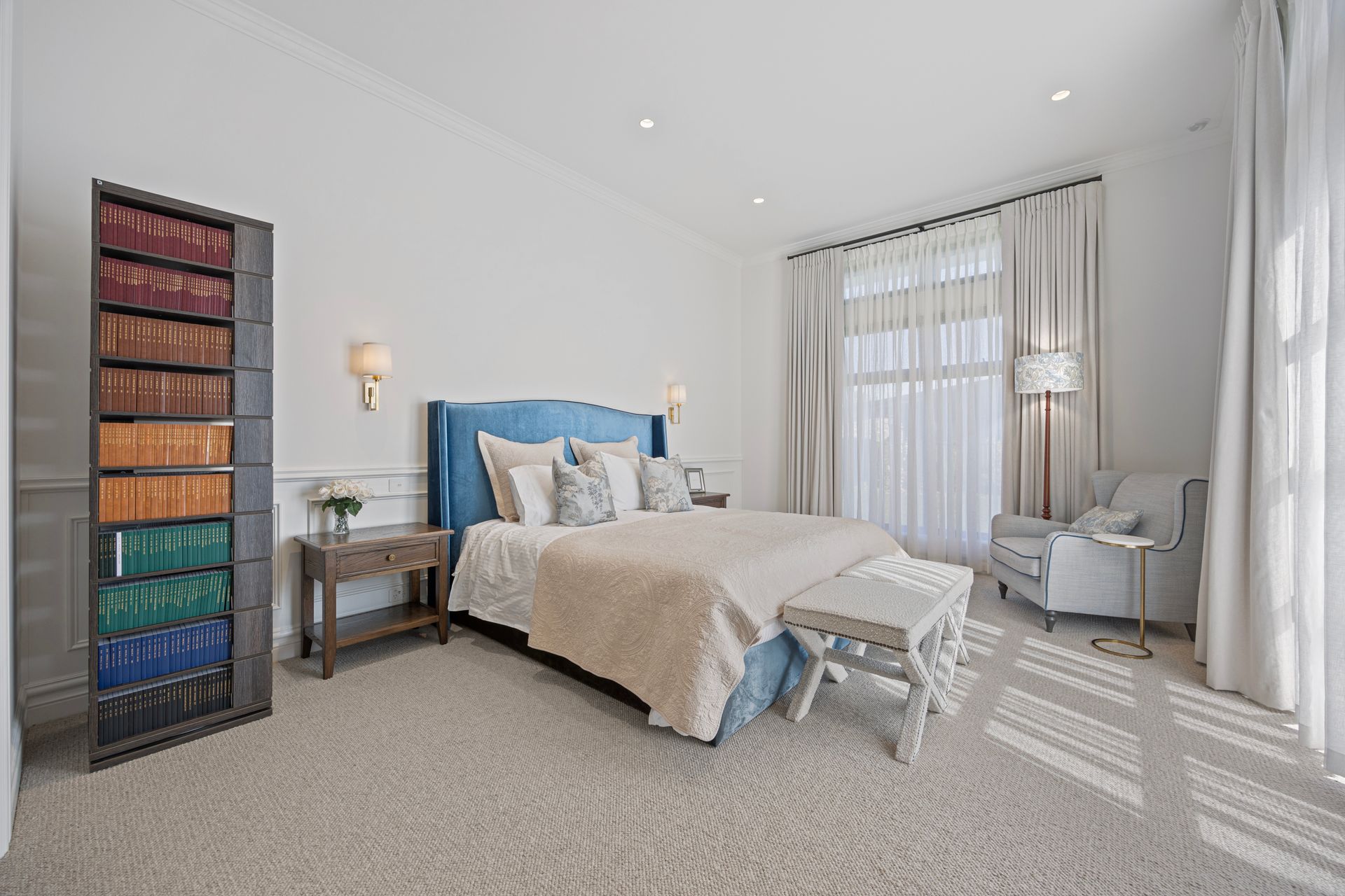 Bedroom with upholstered bedhead and layered textures
