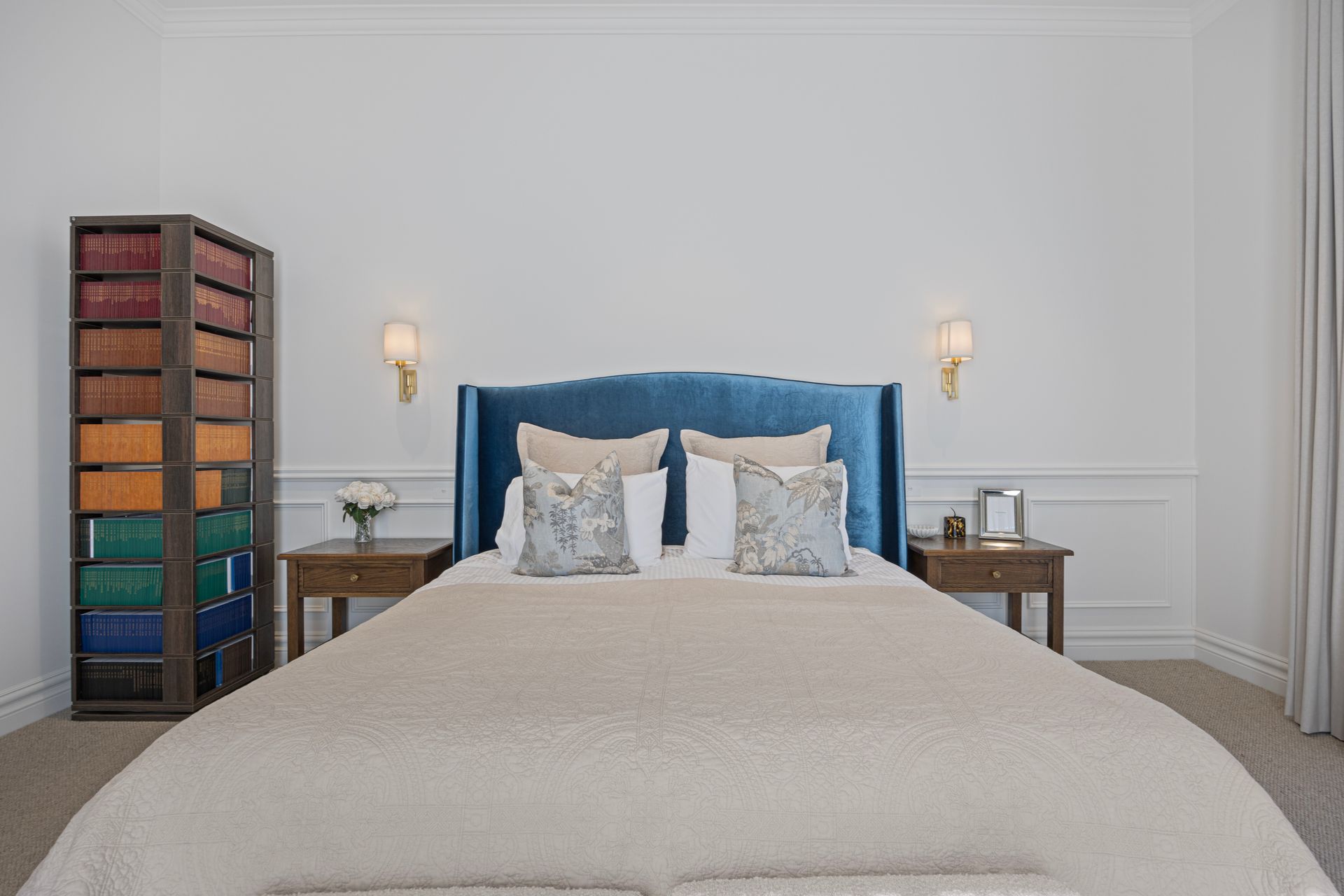 Bedroom with upholstered bedhead and layered textures