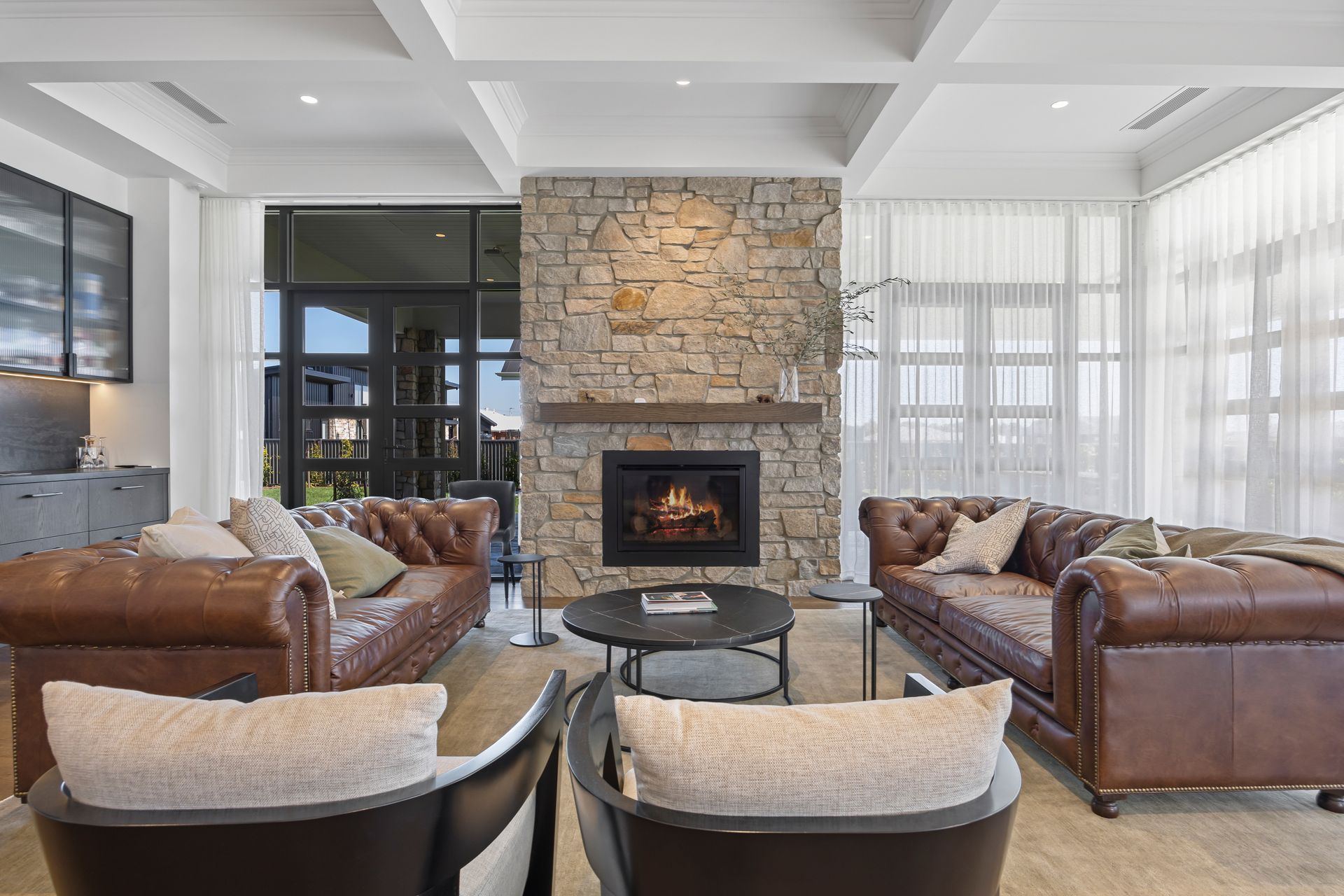 Living area with fireplace and built-in shelving