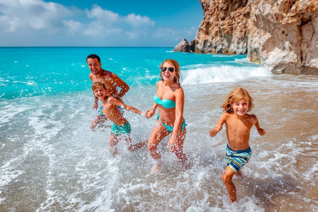 Family having fun at the beach.