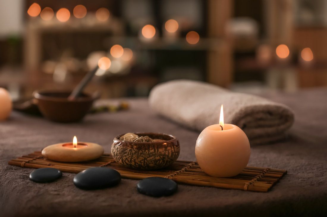 Candles and lotions at a spa.