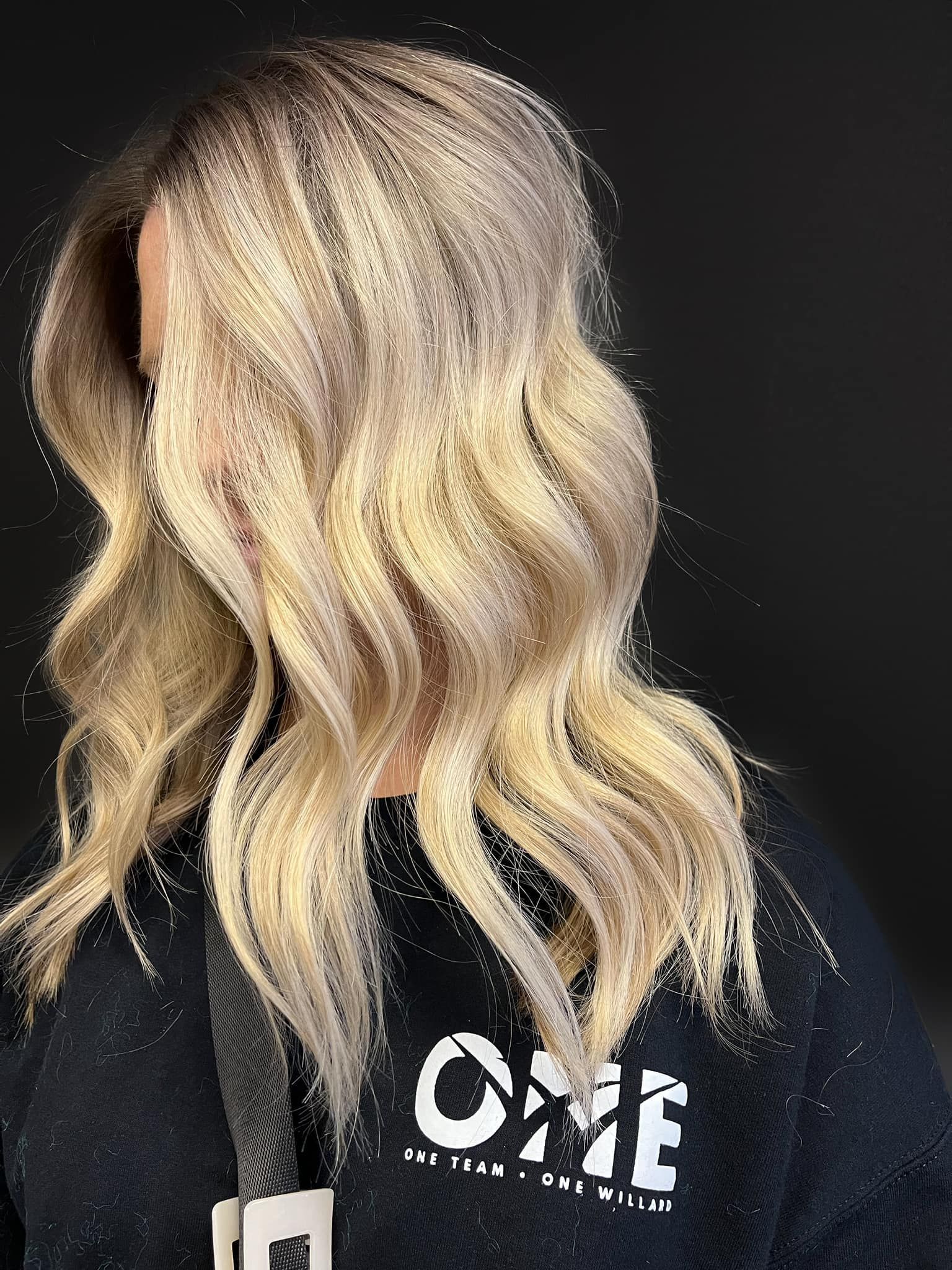 Rich copper red hair color with dimensional tones and long waves near Rogersville, MO.