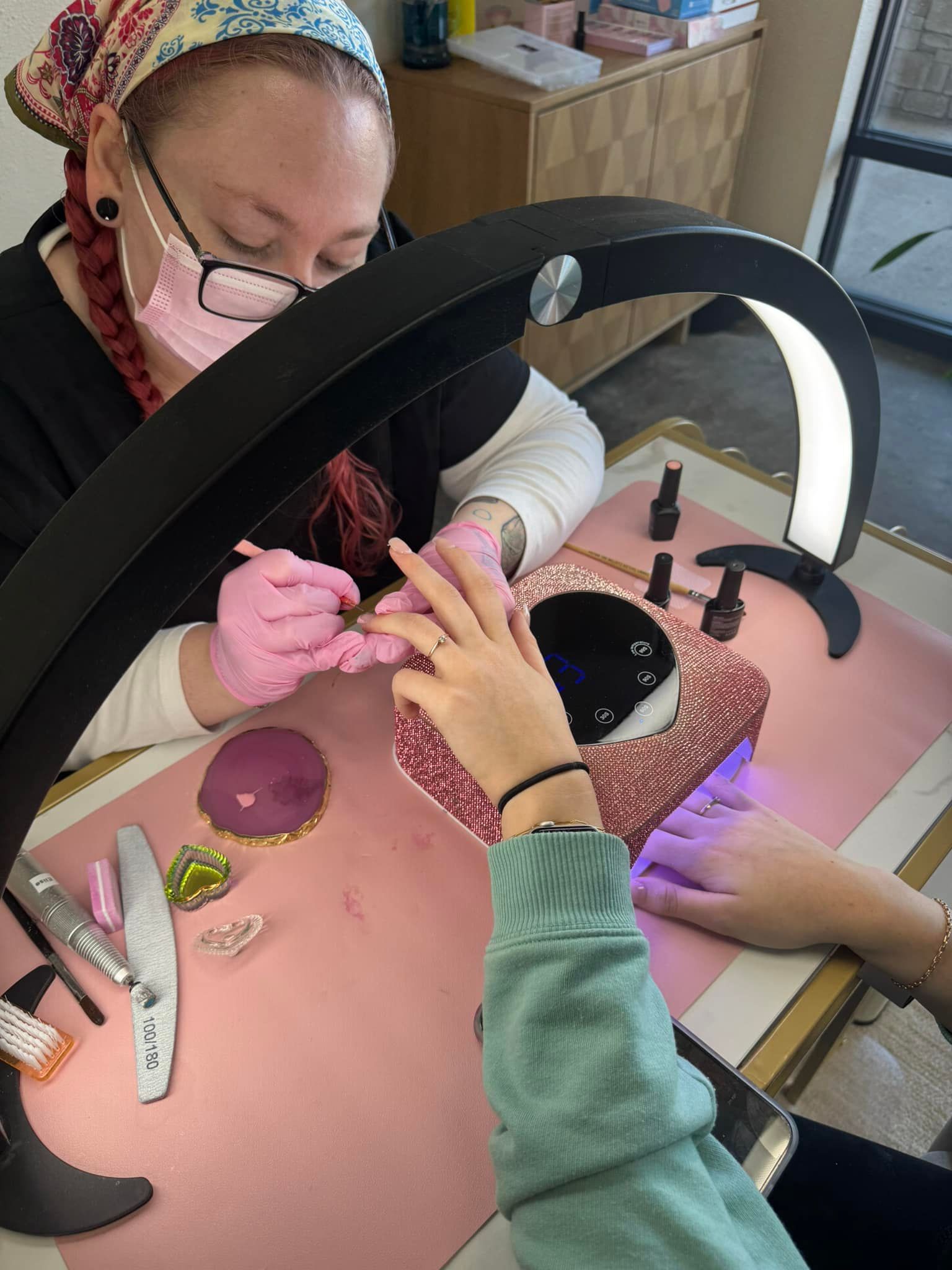 Professional nail technician providing a custom manicure near Strafford, MO.