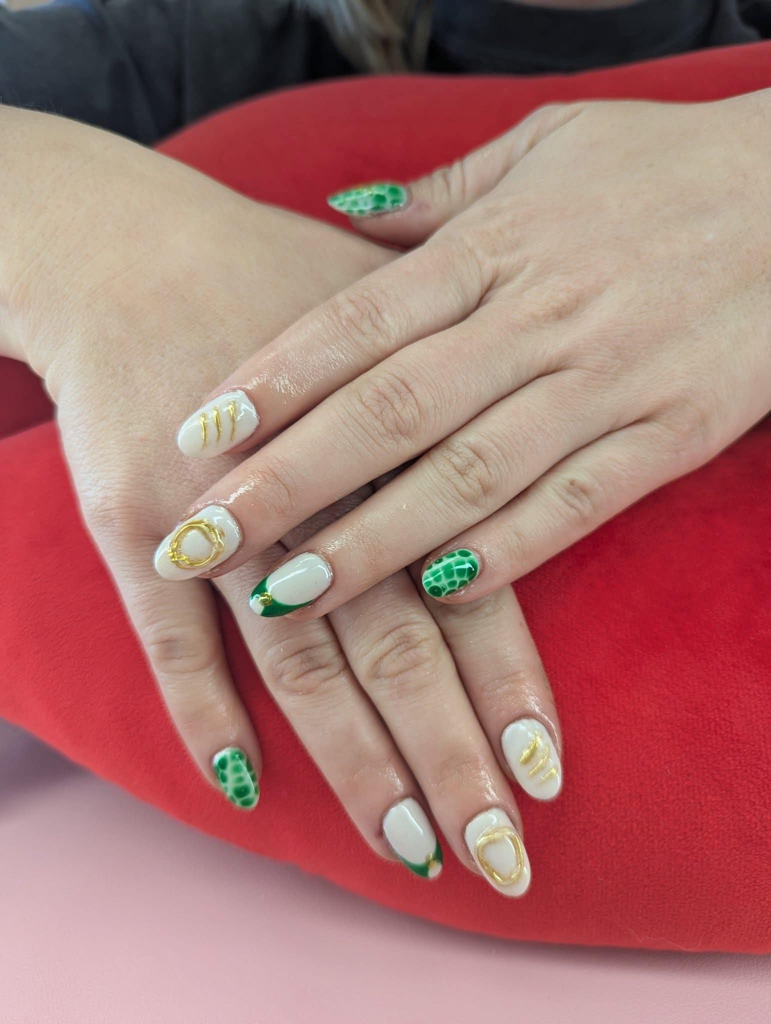 Green, white, and gold custom nail art created by a nail artist near Rogersville, MO.