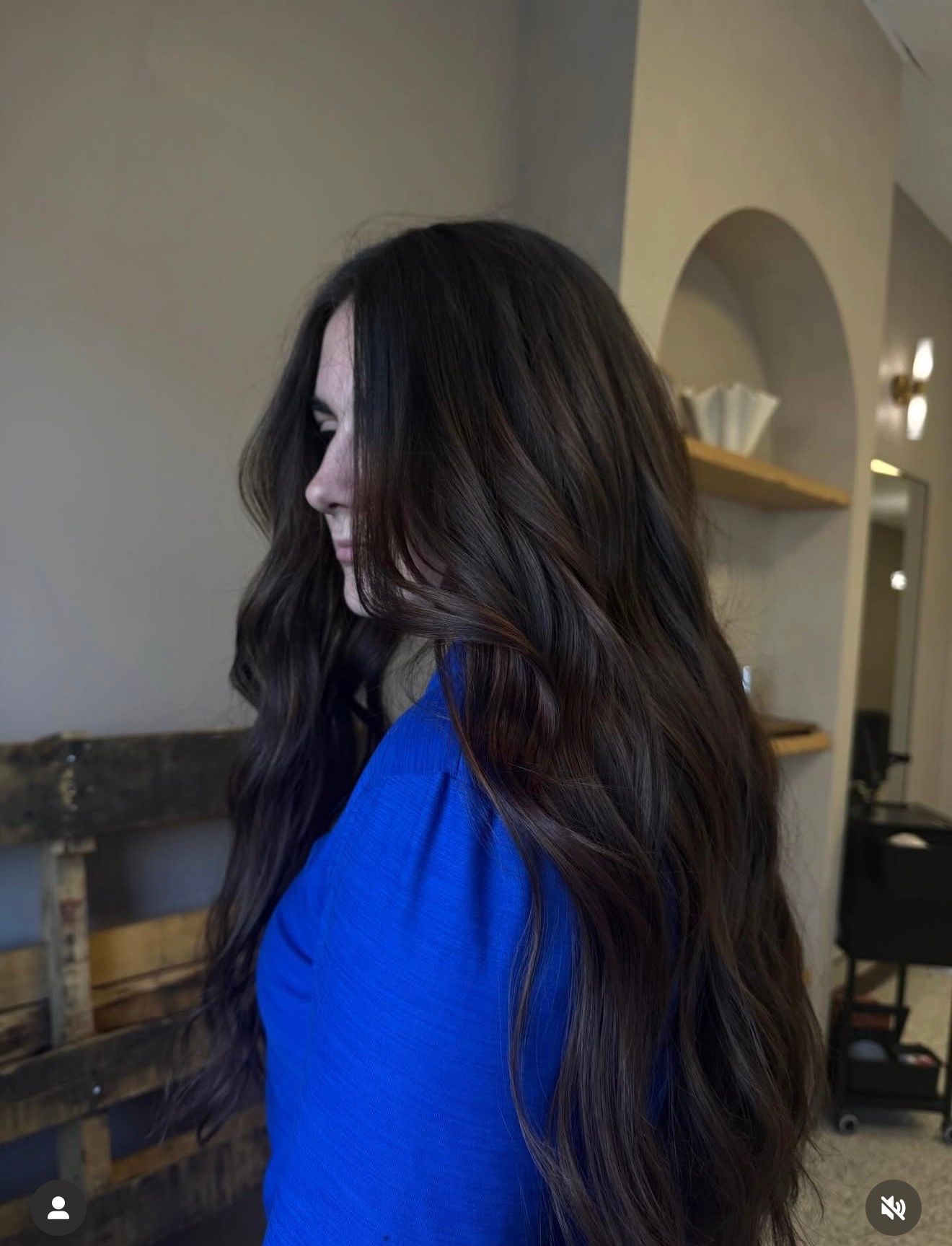 Dark brunette hairstyle with soft layers and natural movement