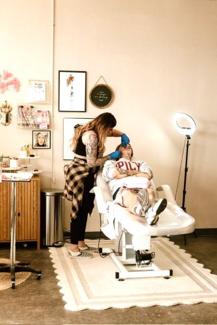 Beauty professional performing an aesthetic treatment at The Girl House near Rogersville, MO.