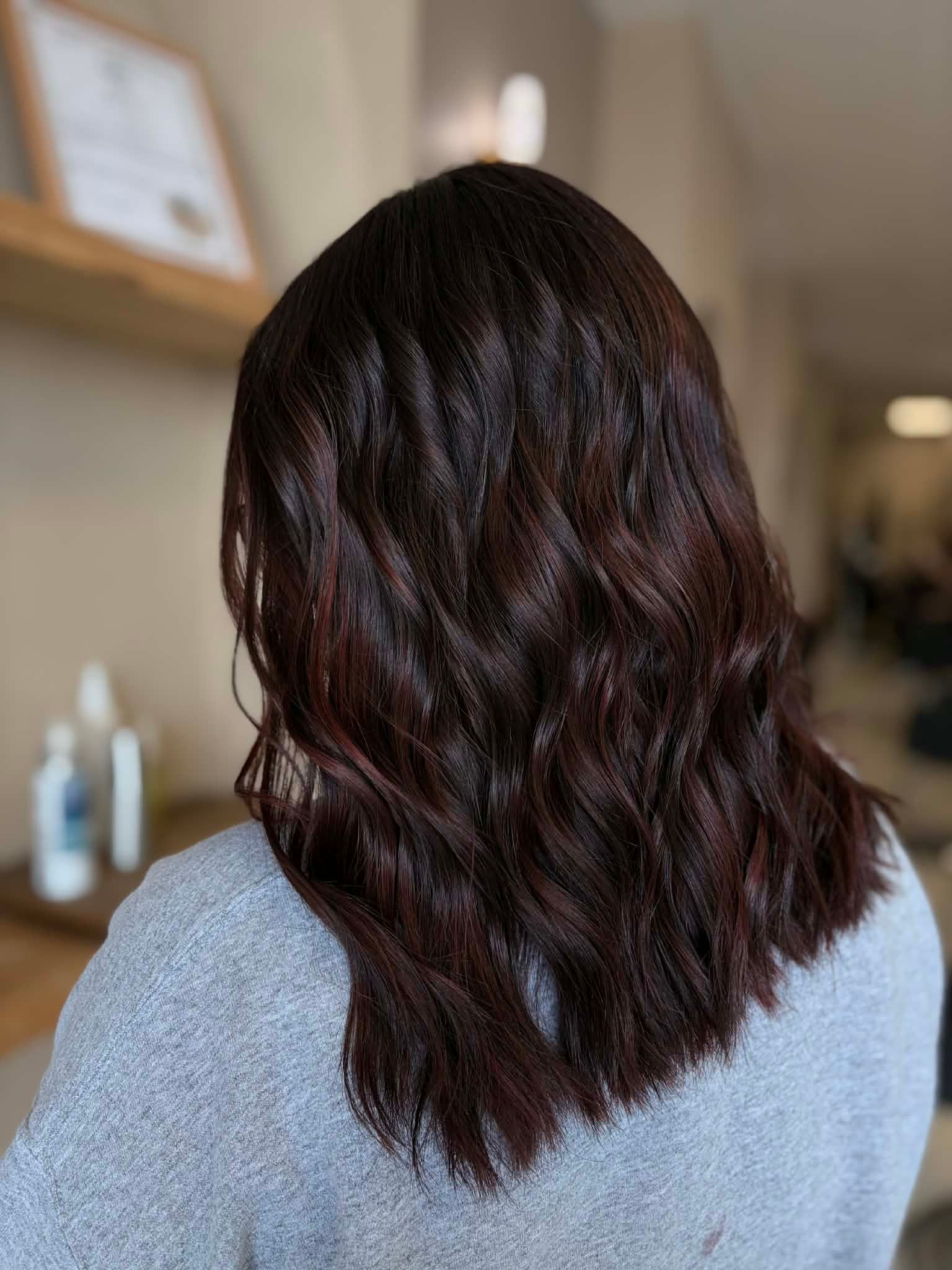 Dark brunette hair with a smooth, glossy finish