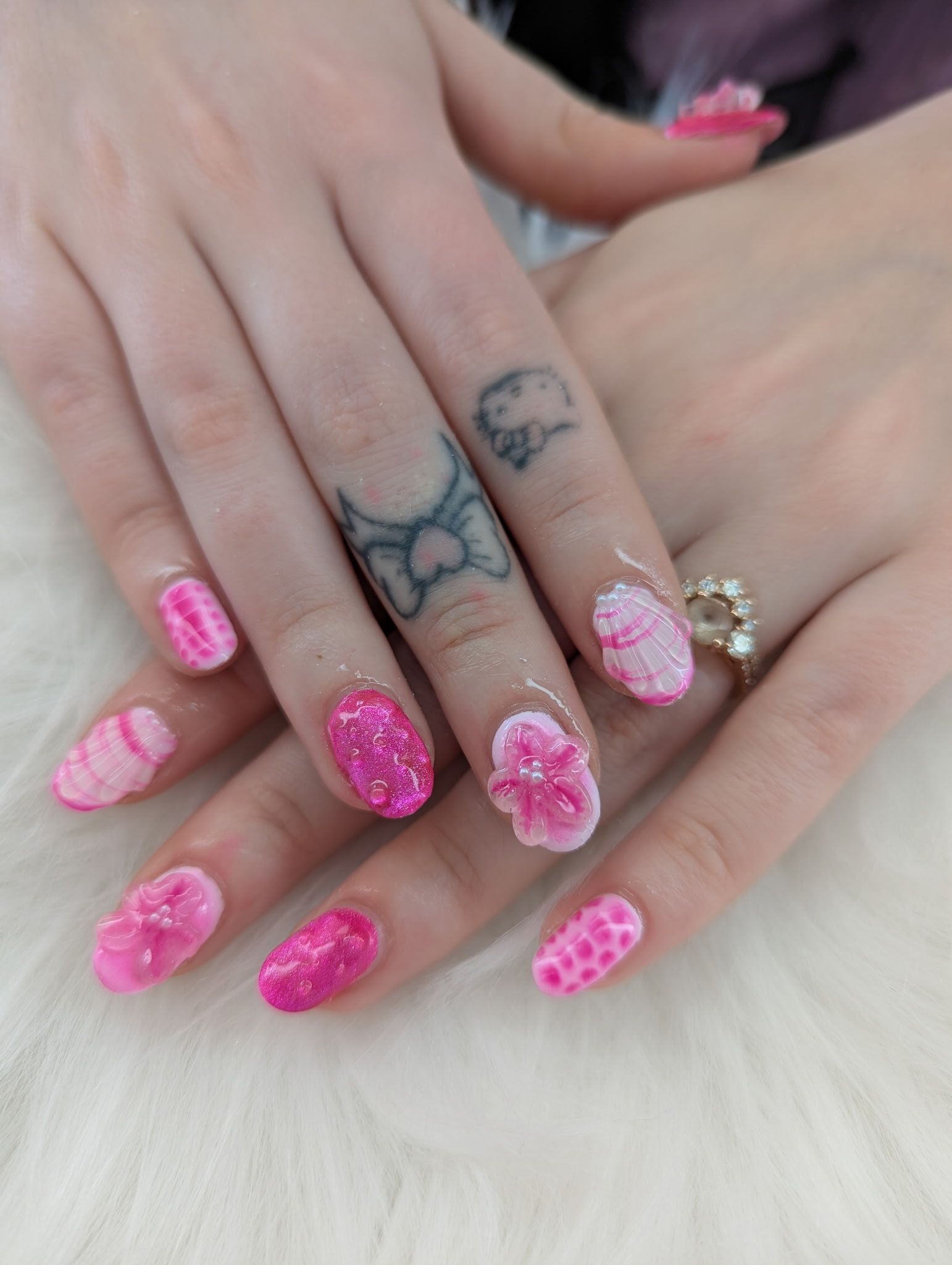 Pink 3D nail art and custom manicure created by a nail artist in Ozark, MO.