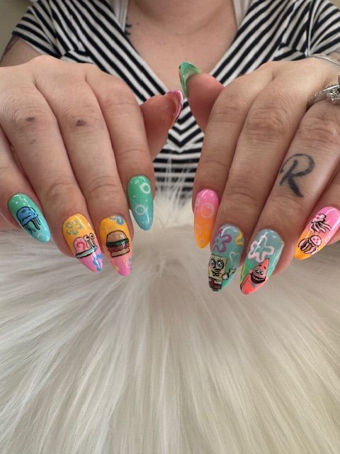 SpongeBob custom nail art and manicure design by a nail artist in Springfield, MO.
