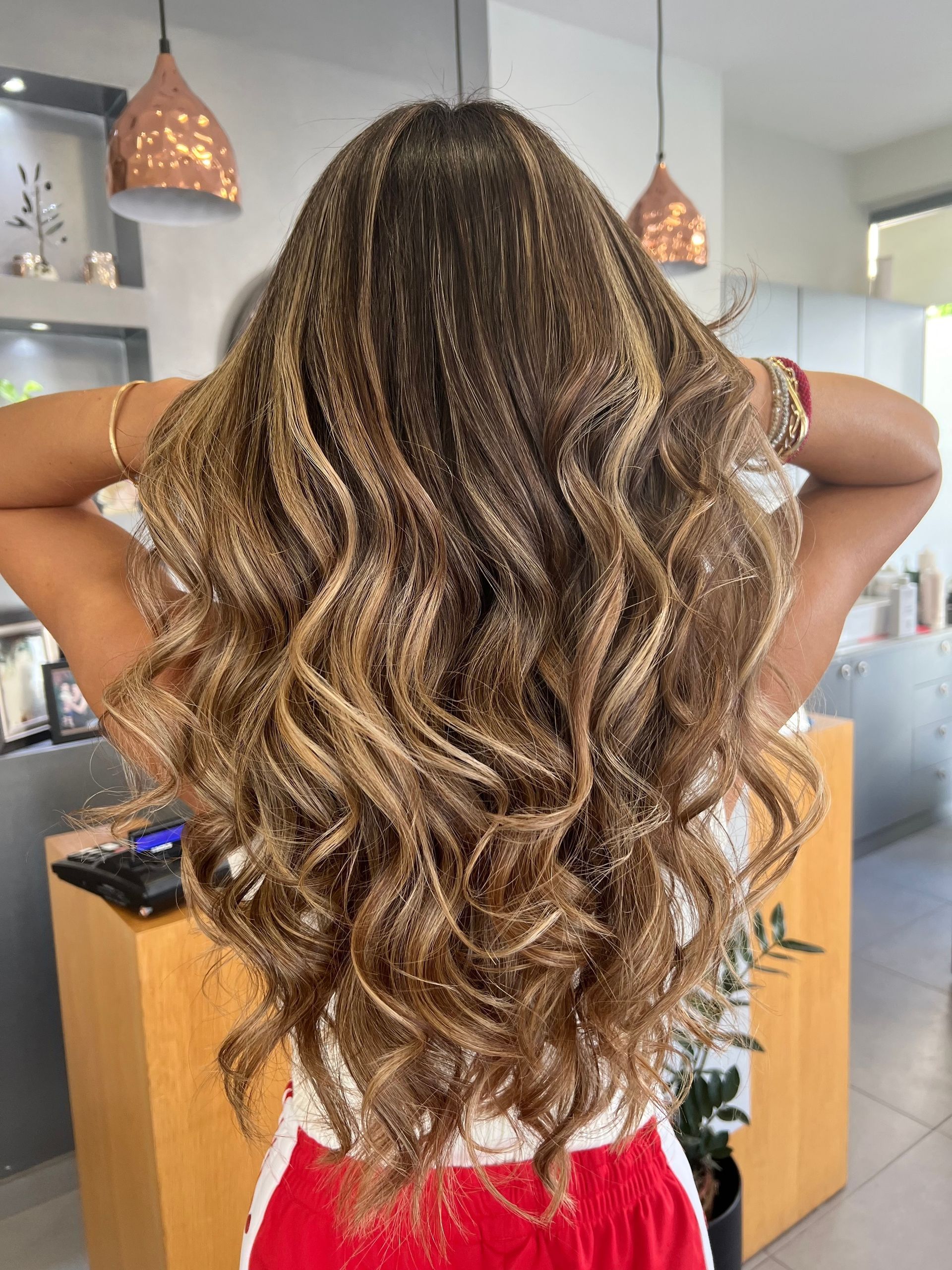 woman with brown and blonde balayage hair done in Springfield MO