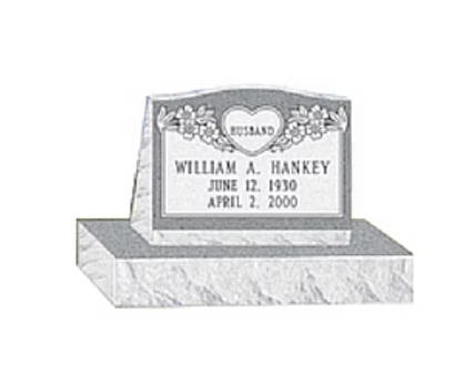 Gray gravestone plaque reading