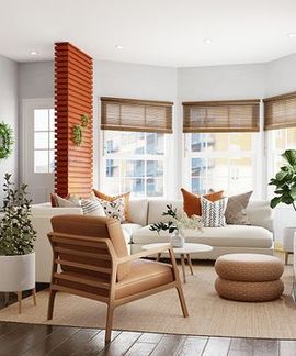 Bright modern living room with white sofa, tan chairs, woven stools, plants, and large windows with bamboo blinds