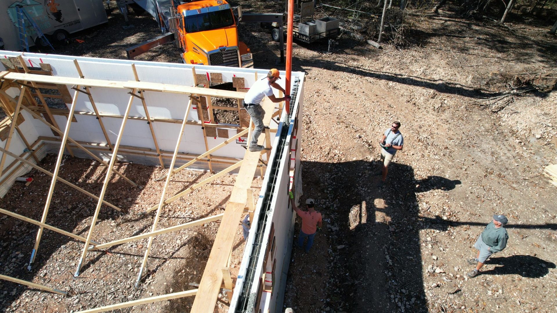 ICF crew member building icf footers and walls for custom home in Republic MO
