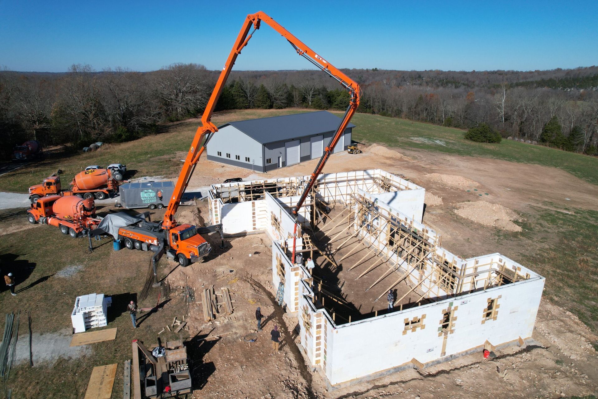 ICF crew member building icf footers and walls for custom home in Republic MO
