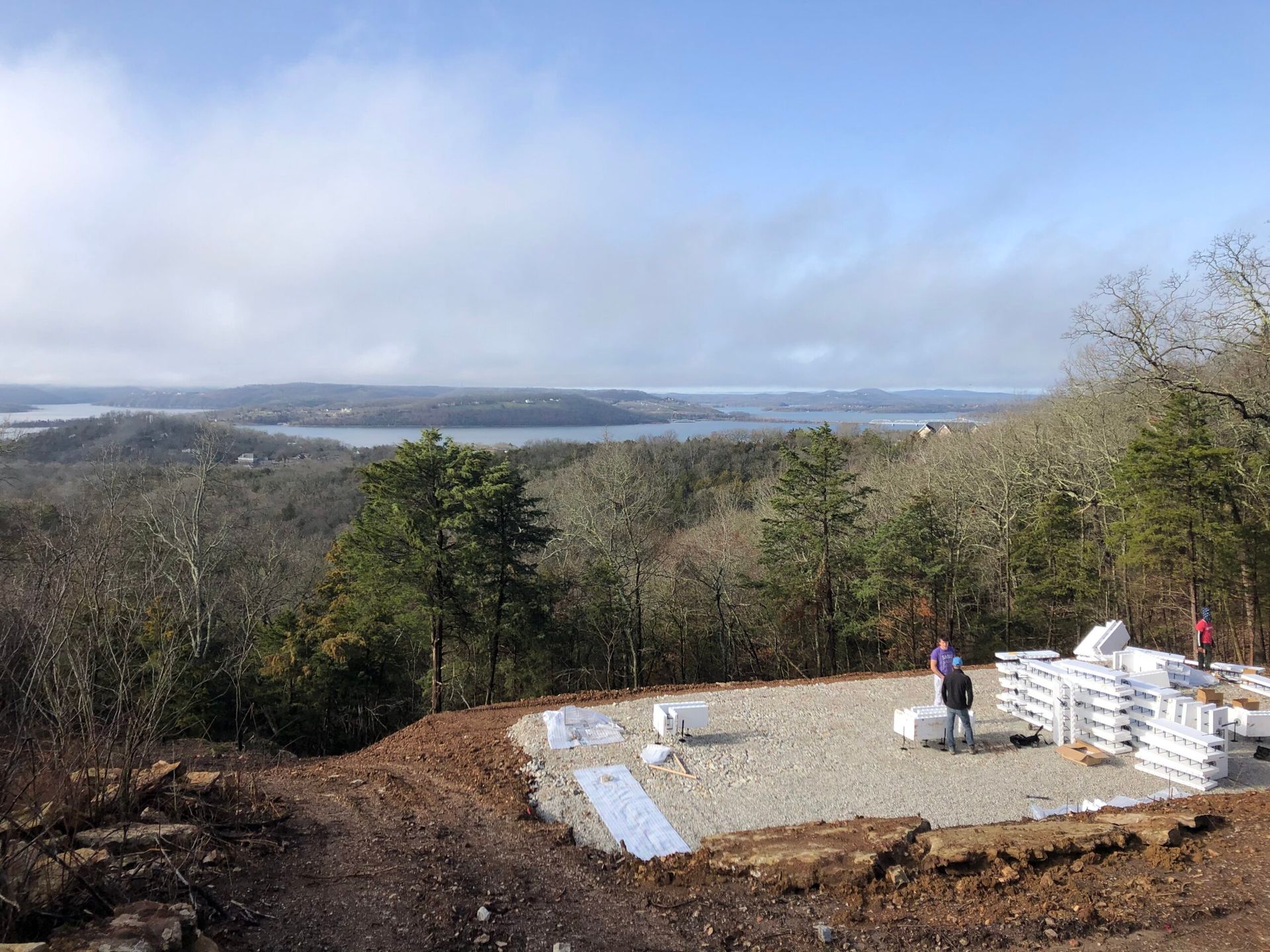 icf crew members assembling icf blocks for home on hill in ozark mo
