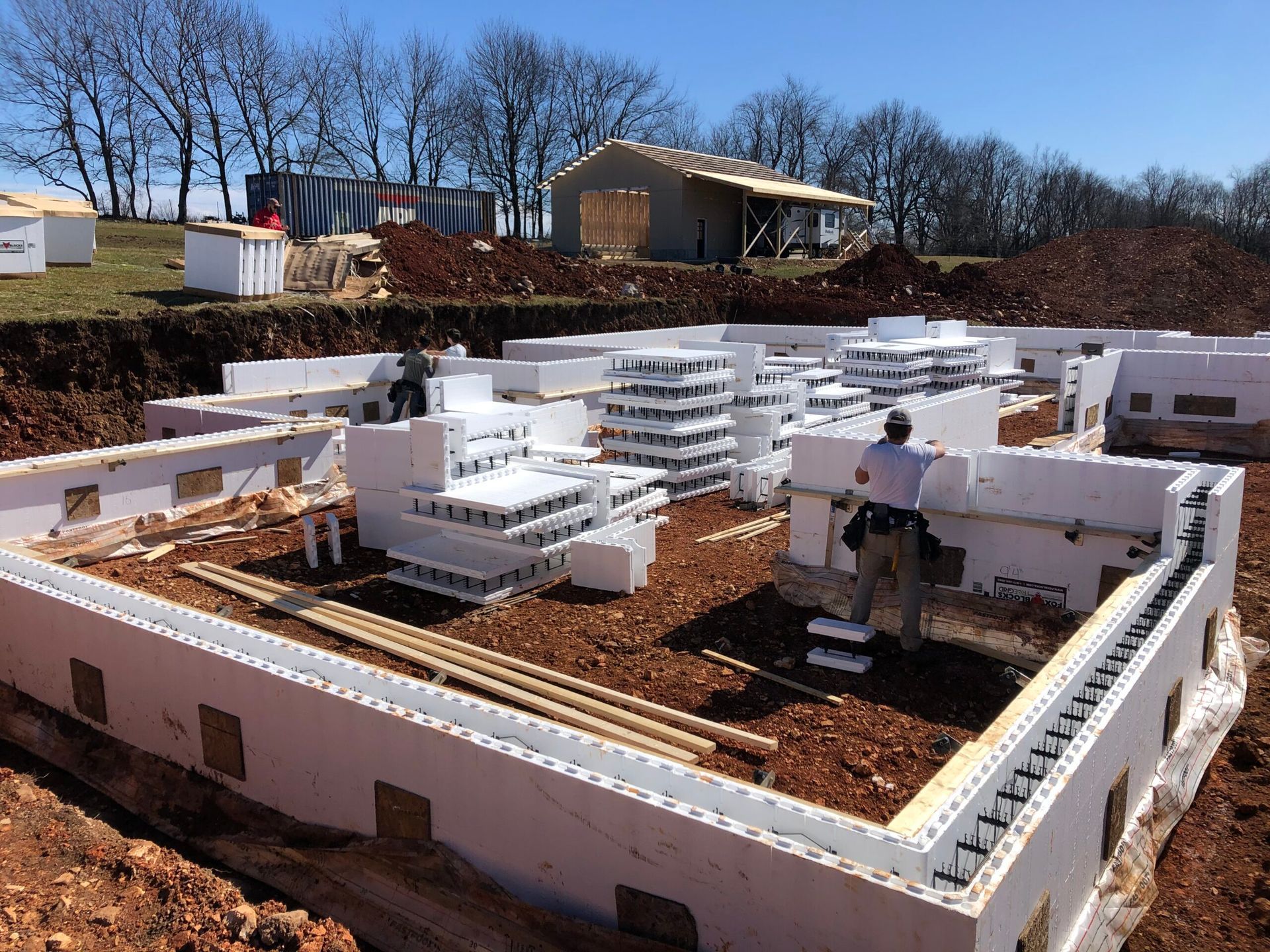 icf crew member installing icf footers and walls - Little Rock AR